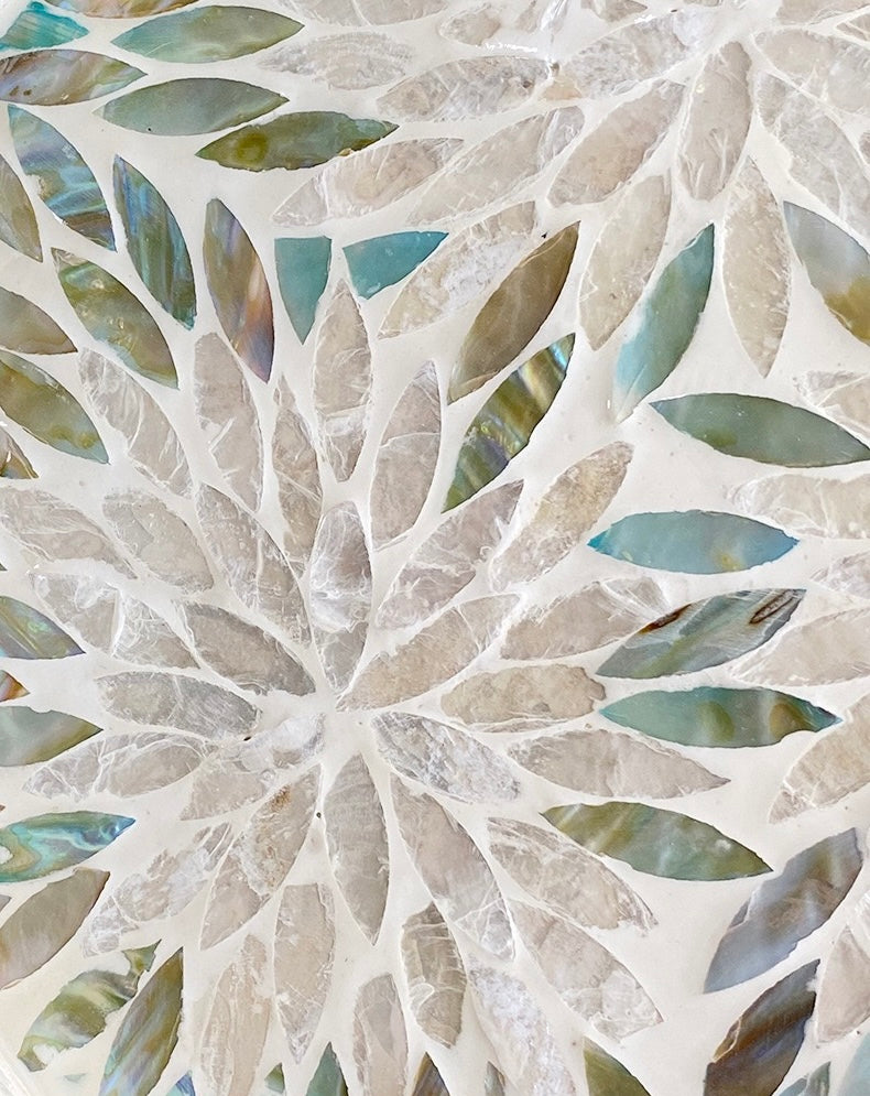 Mosaic pattern with leaf-shaped tiles in neutral colors