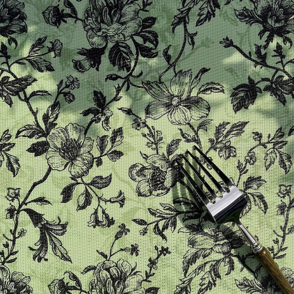 Floral-patterned fabric with a wooden tool on top